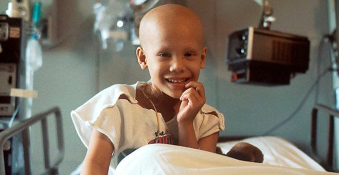 Child with cancer Common chemotherapy drug linked to hearing loss in children
